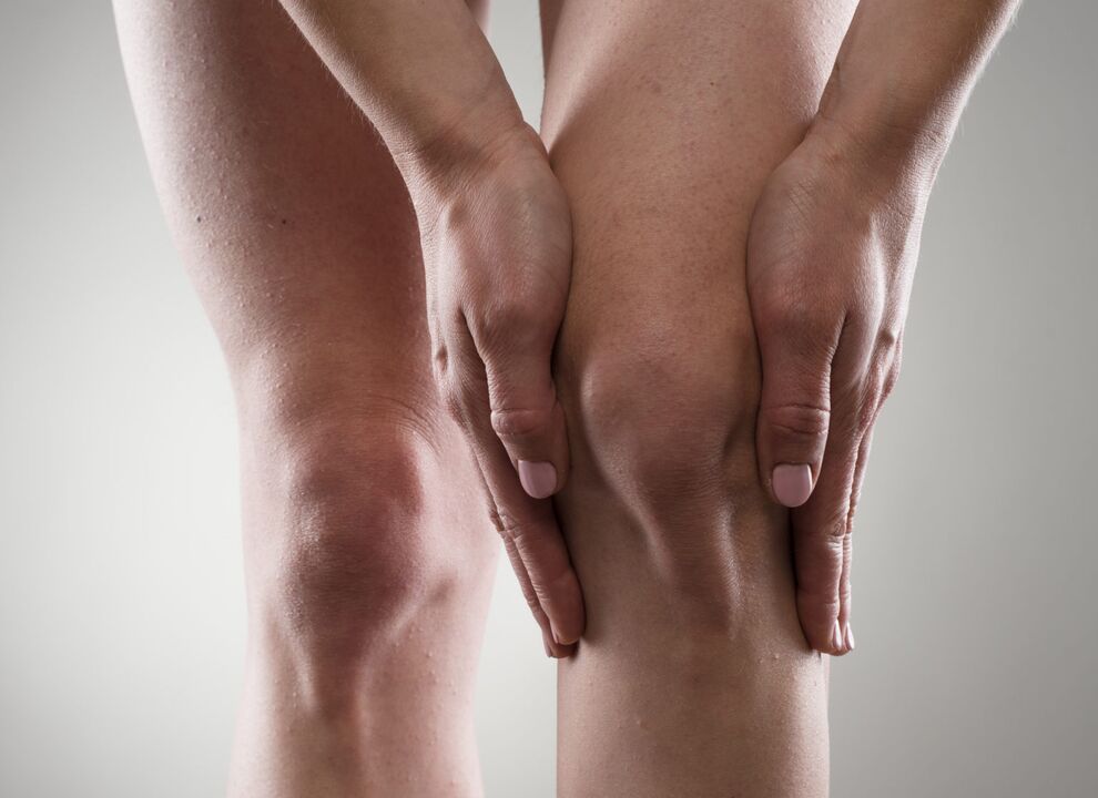 Osteoarthritis of the knee joint, manifested as pain and stiffness